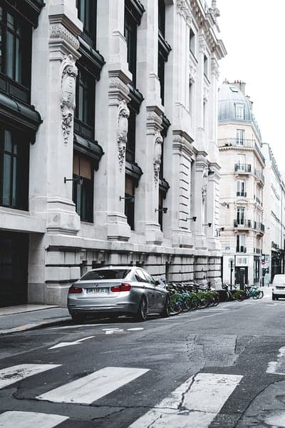 Elegant Paris Street with BMW and Green Rental Bikes