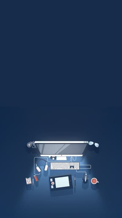 Minimalist desk setup with computer and tablet