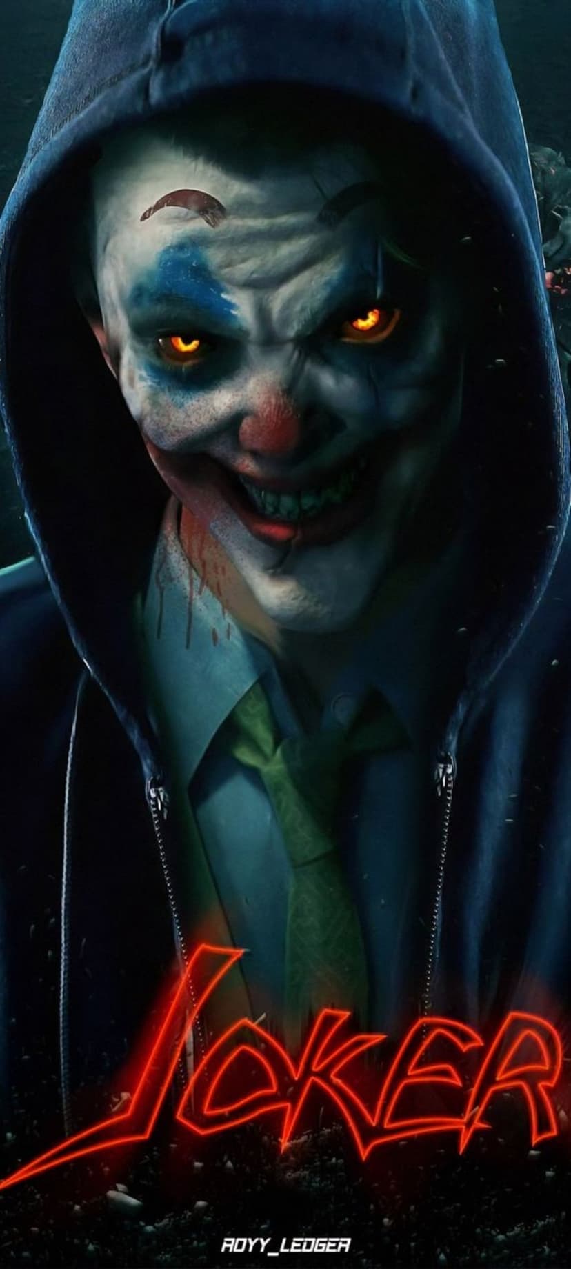 Joker clown with glowing orange eyes and a sinister smile wears a dark hoodie and green tie near red neon text.