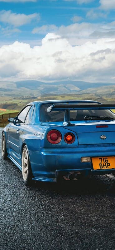 Blue Nissan Skyline R34 GTR with Large Wing