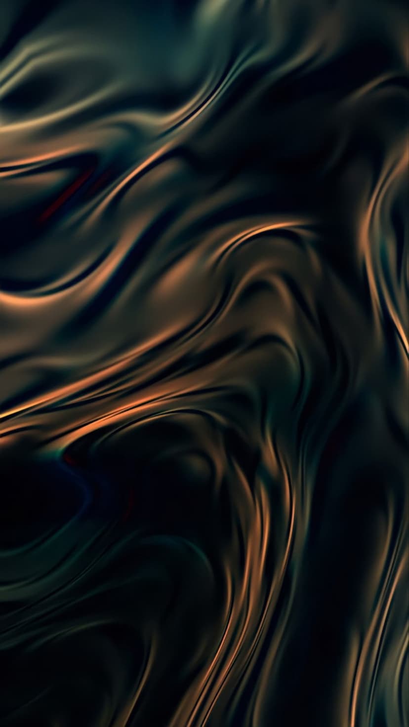 Dark metallic fabric with undulating waves of gold and teal light creating a shimmering liquid texture.