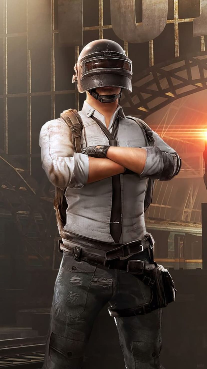 Battle royale survivor in a level three helmet stands with arms crossed against a dark industrial backdrop.