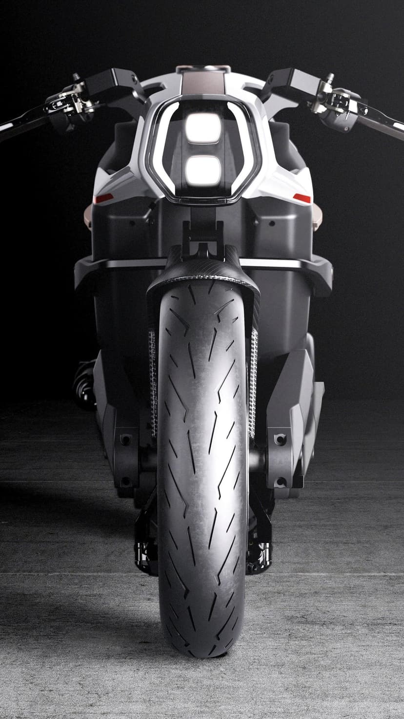 Futuristic motorcycle front view featuring angular white LED headlights and wide tires on a dark background.