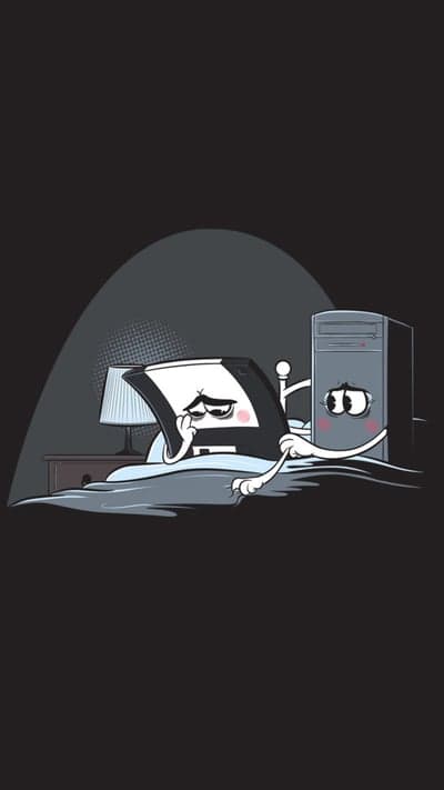 Computer and Floppy Disk Couple in Bed