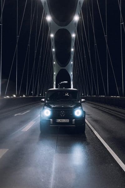 Mercedes-AMG G 63 Night Bridge Crossing Phone Wallpaper