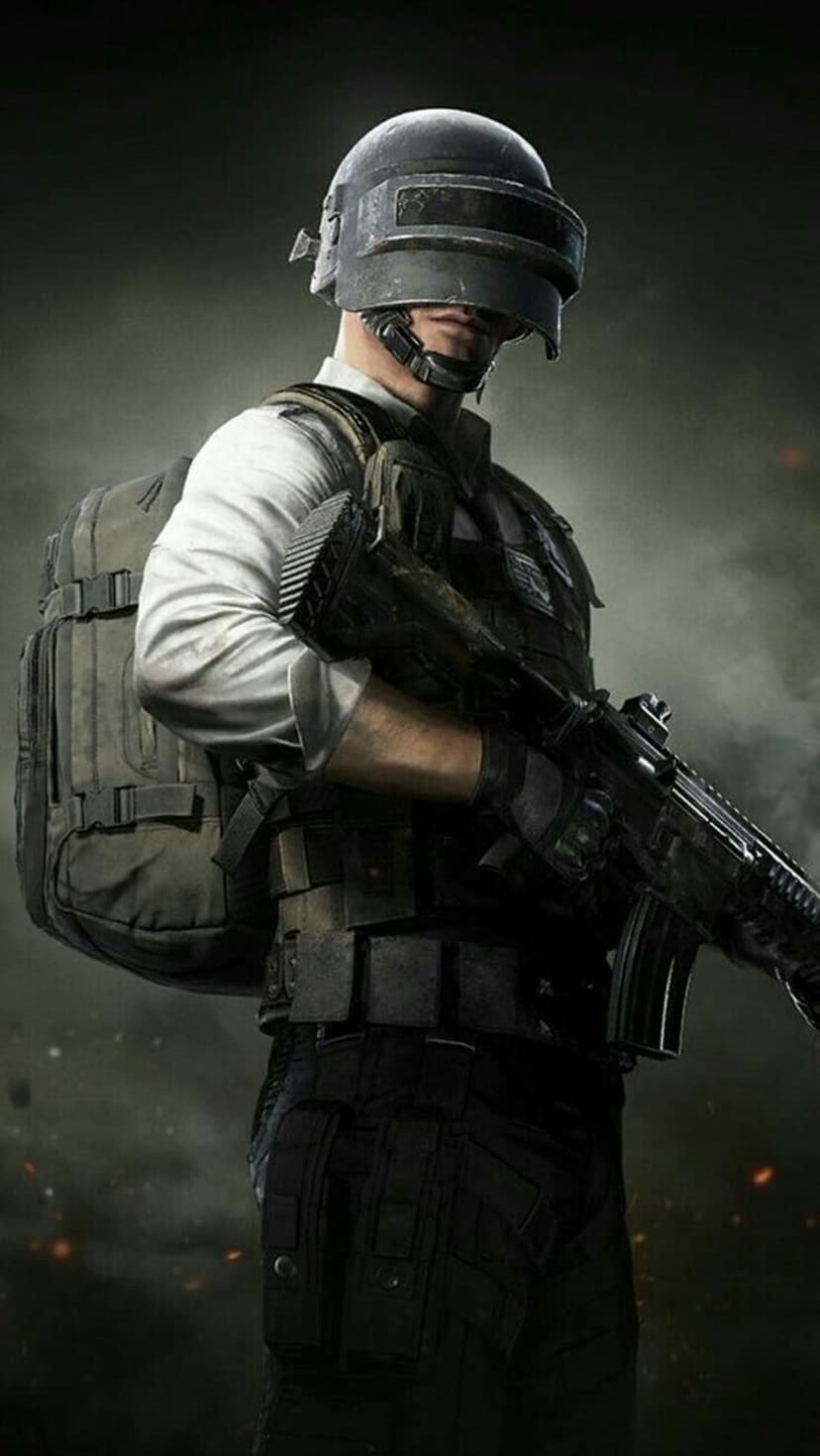 Soldier in a Level 3 helmet and tactical gear holds a rifle amidst dark smoke and distant orange fire embers.