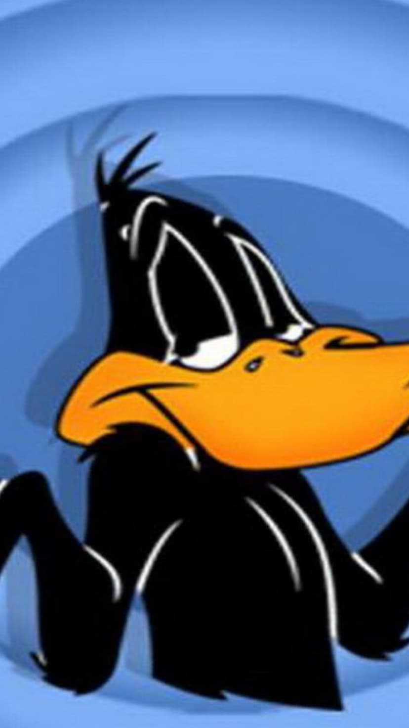 Daffy Duck shrugs his wings with a confused expression against a blue concentric swirl cartoon background.