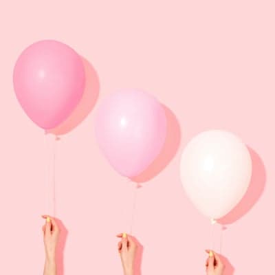 Pastel Balloons and Hands Pink Aesthetic Phone Background