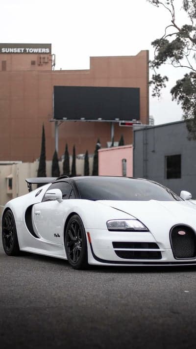 Bugatti Veyron Hypercar Urban Sunset Phone Wallpaper