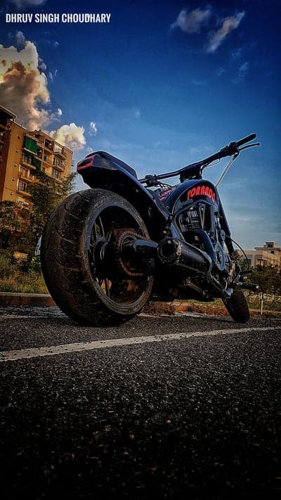 Black Tornado Motorcycle Under Blue Sky