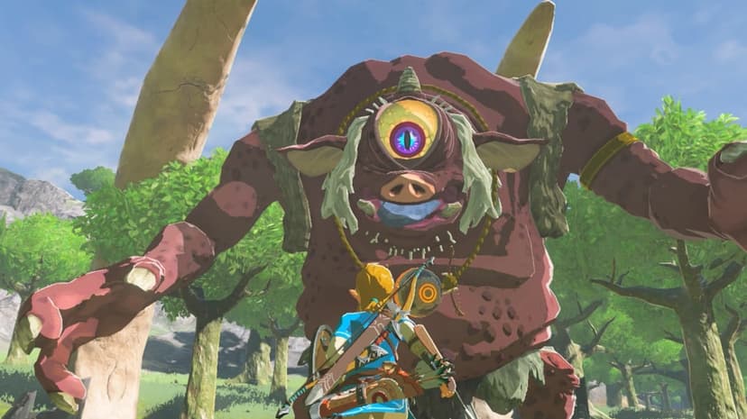 Link faces a giant red one-eyed Hinox boss in a sunny forest with bone-like structures in the background.