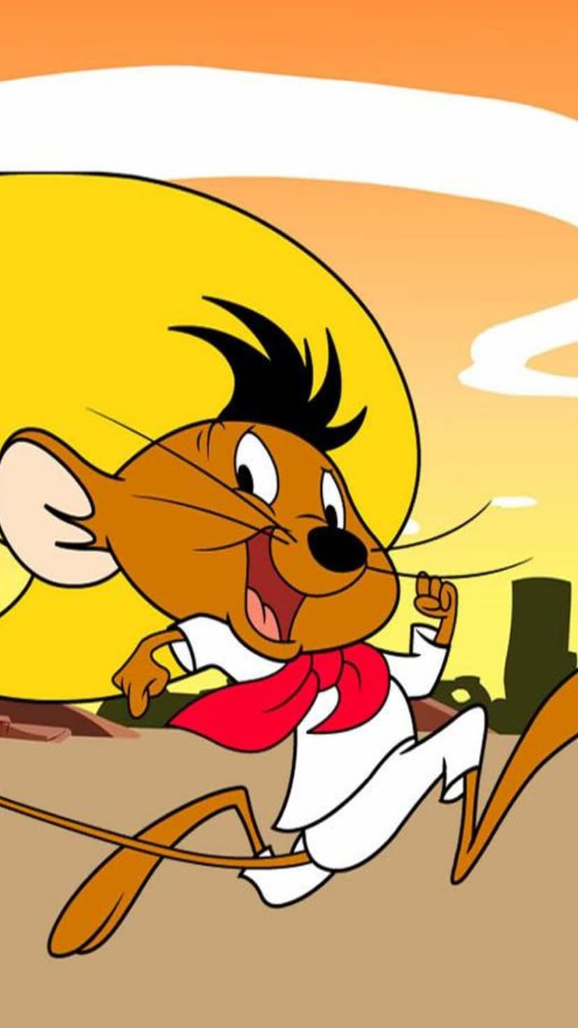 Speedy Gonzales sprints through a desert at sunset wearing a yellow sombrero, red scarf, and white shirt.