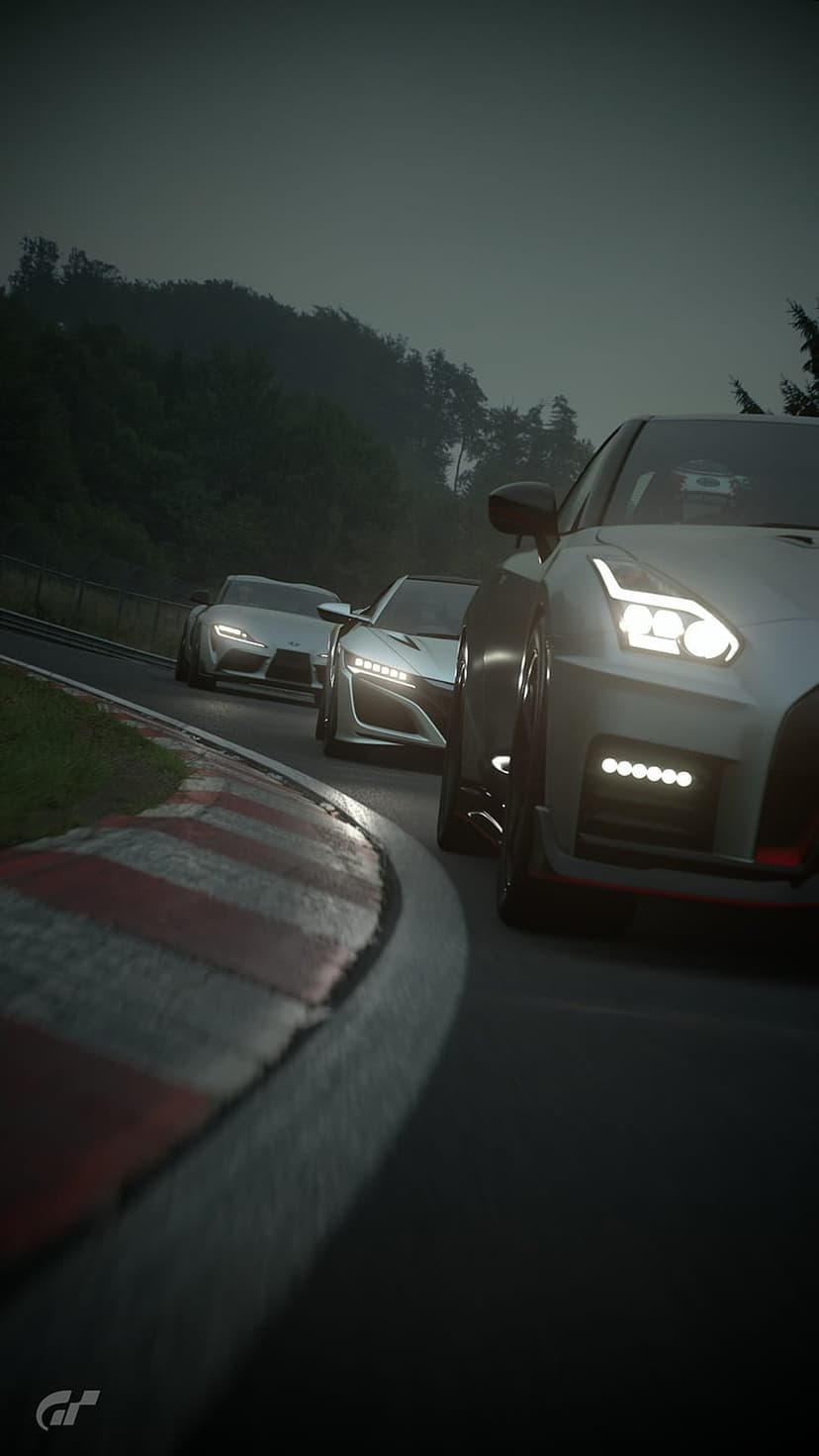 Nissan GT-R and Honda NSX sports cars cornering on a reflective wet racetrack during a moody dusk racing event.