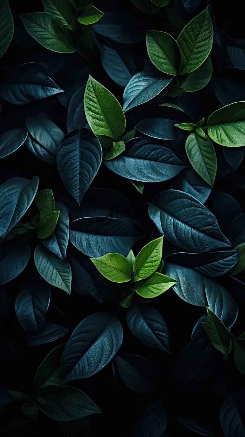Emerald green leaves with vibrant lime accents and deep shadows highlight intricate organic textures and veins.