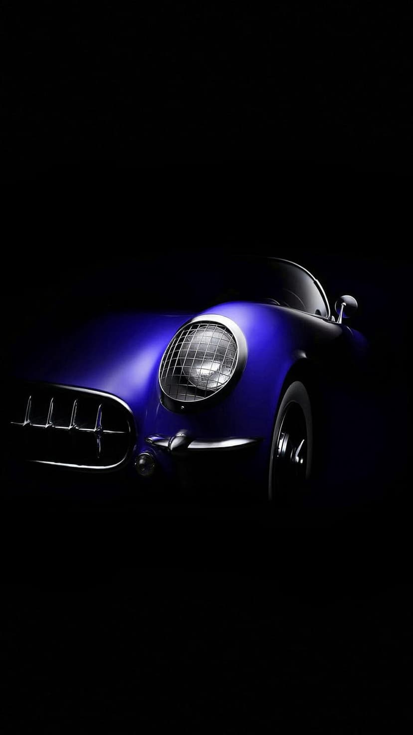Blue vintage car headlight with mesh cover and a chrome grille detail against a dark black background.