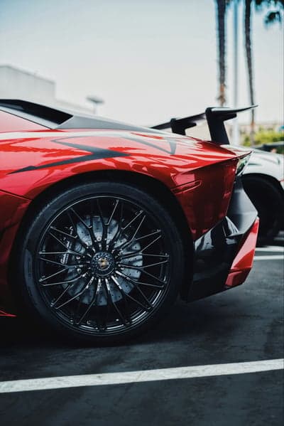 Aggressive Red Lamborghini Aventador Smartphone Background