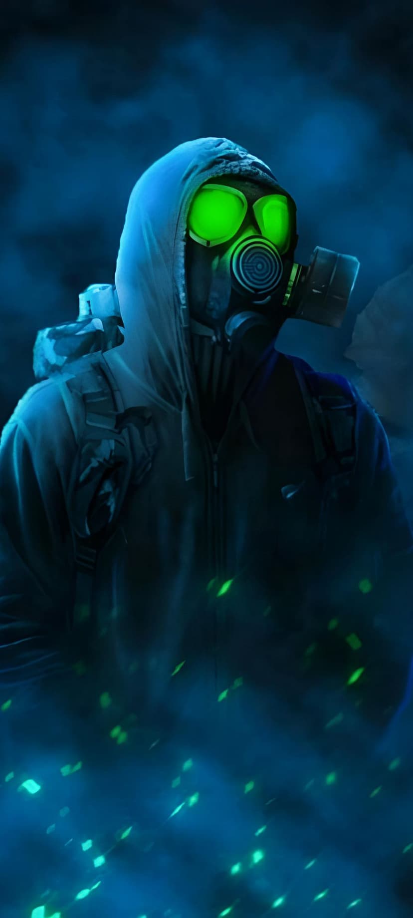 Masked survivor with radiant green eyepieces stands in a blue mist filled with shimmering toxic particles.
