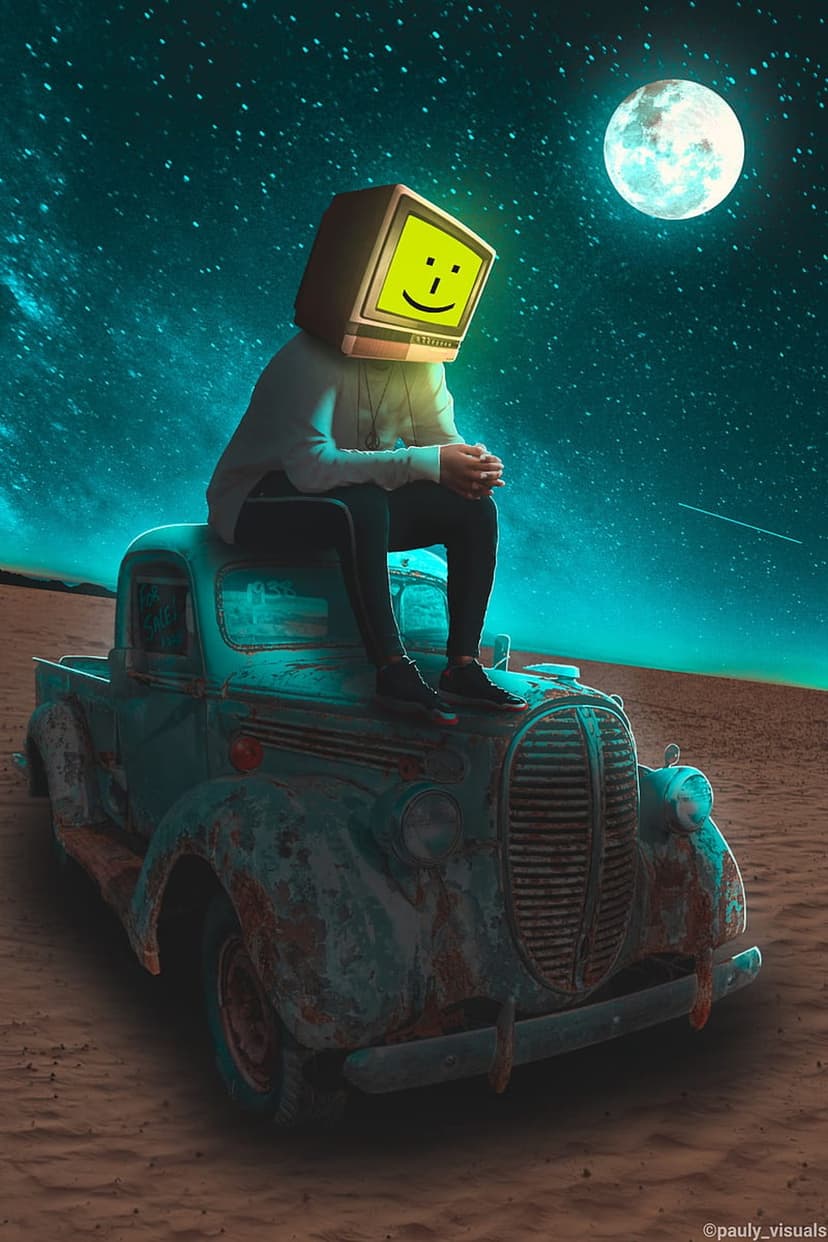 A person with a smiley face computer monitor head sits on a rusty pickup truck under a glowing moon and stars.