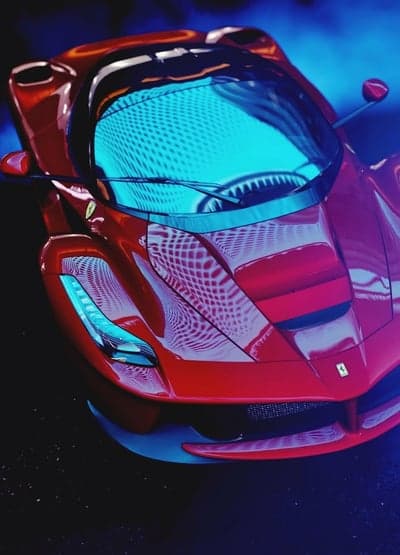 Red Ferrari LaFerrari hypercar with blue reflections