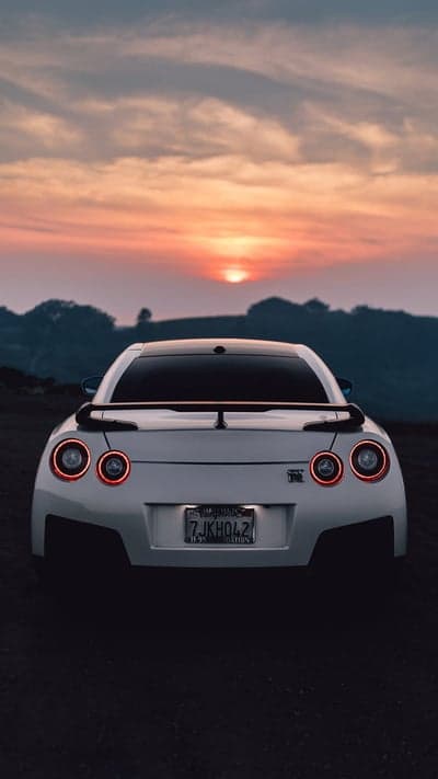 Nissan GT-R Sunset Glow Rear Profile Mobile Wallpaper