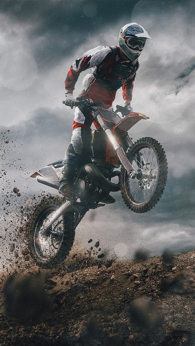 Motocross rider soaring mid-air on a dirt bike over a dusty track under a dark, dramatic, and cloudy sky.