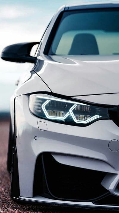 BMW M4 Angel Eyes Headlight Detail Mobile Wallpaper