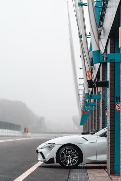 Foggy White Toyota Supra Pit Lane Mobile Wallpaper