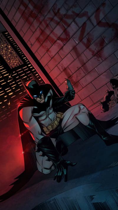 Batman poised with Batarang on a dark, gritty rooftop