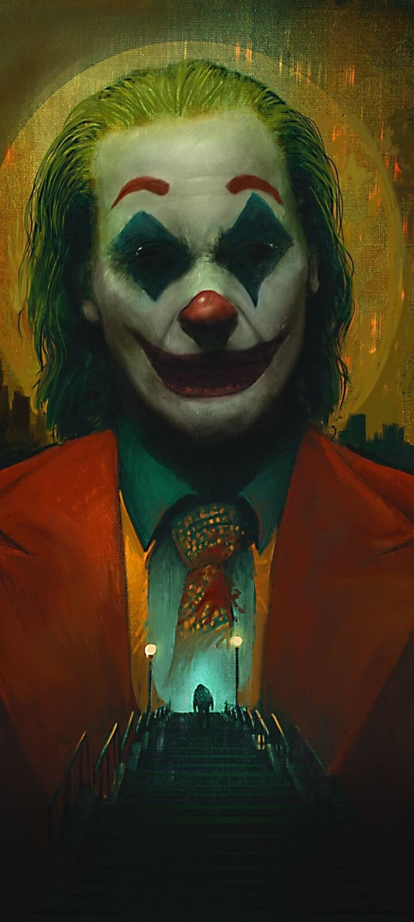 Arthur Fleck in clown makeup and orange suit stands before a golden circle and a silhouetted staircase scene.