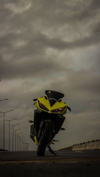 Yellow Sports Bike on a Moody Road