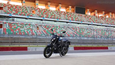 Black Yamaha MT-15 Motorcycle on Racetrack Desktop Wallpaper