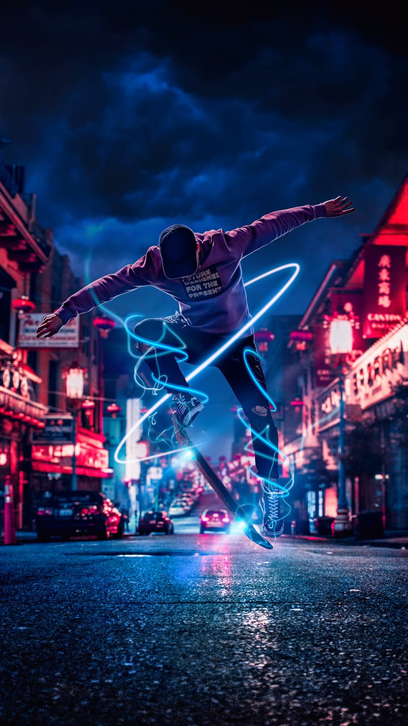 Skateboarder executing a mid-air jump surrounded by blue light trails on a neon-lit city street at night.