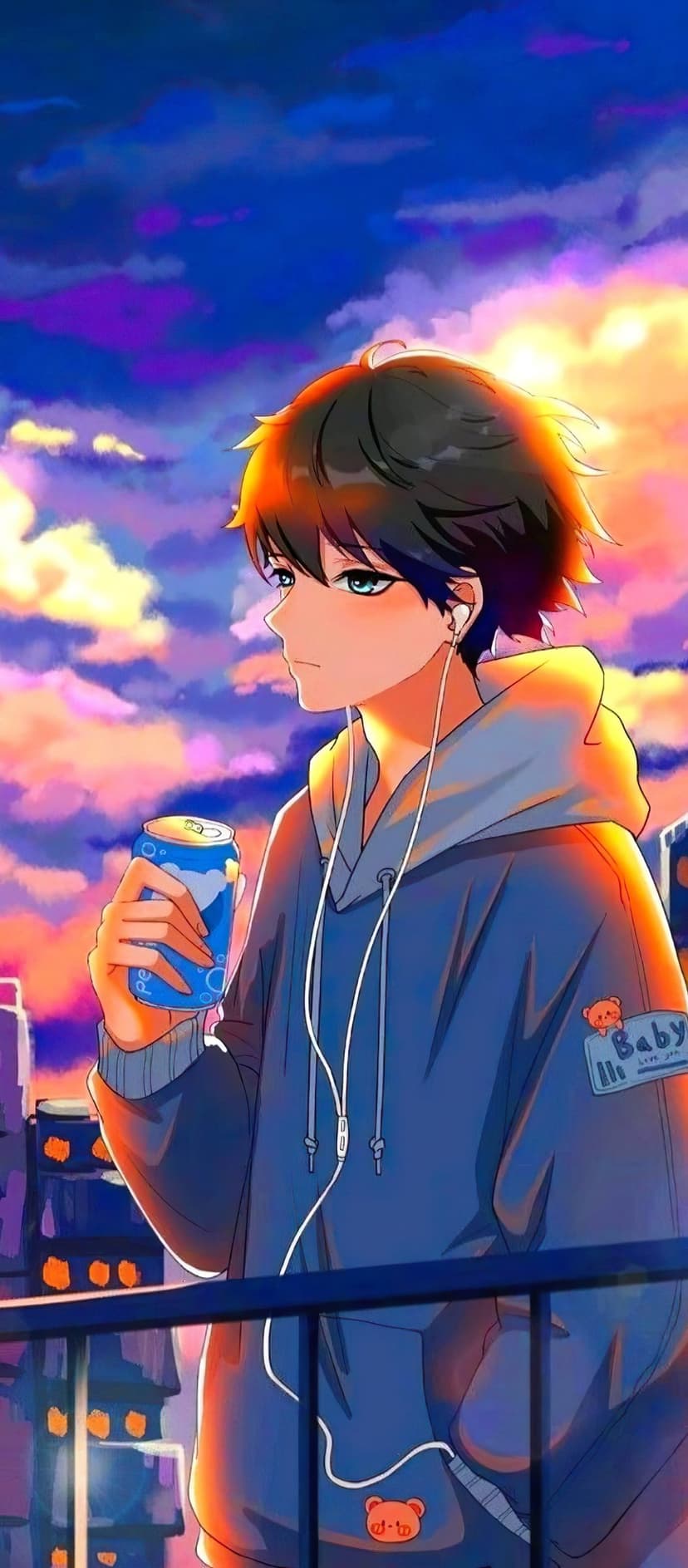 Young man in a blue hoodie holding a soda can on a balcony overlooking a purple and golden sunset city skyline.