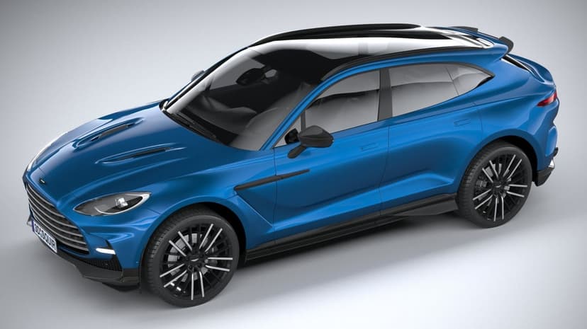 Metallic blue luxury SUV with black multi-spoke wheels and a sleek black roof in a grey studio setting.