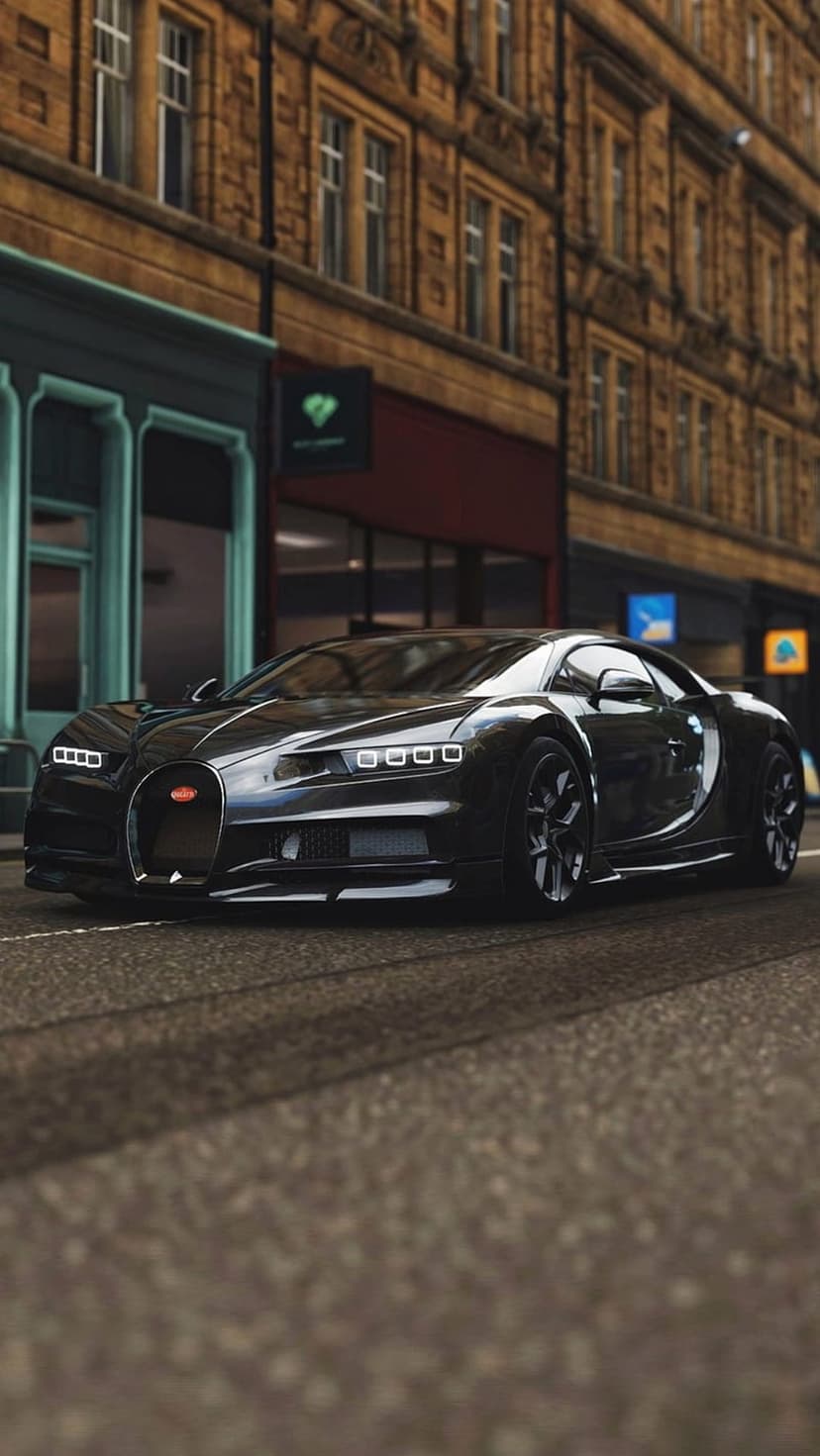 Black Bugatti Chiron hypercar driving on a cobblestone street past classic stone buildings in a European city.