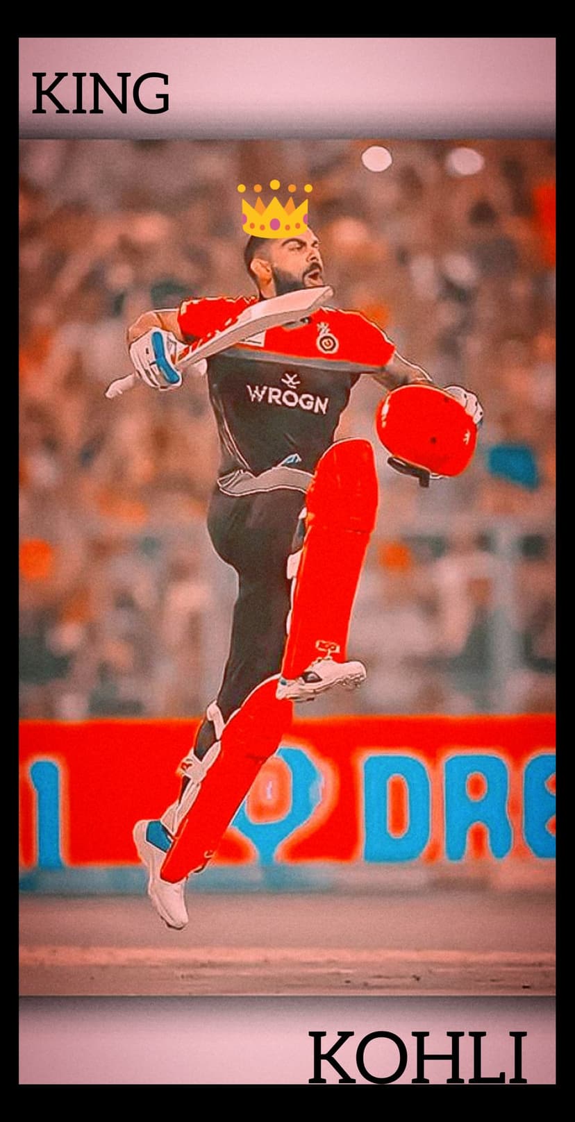 Virat Kohli in a red cricket kit wears a gold crown while leaping with a bat against a blurred stadium.