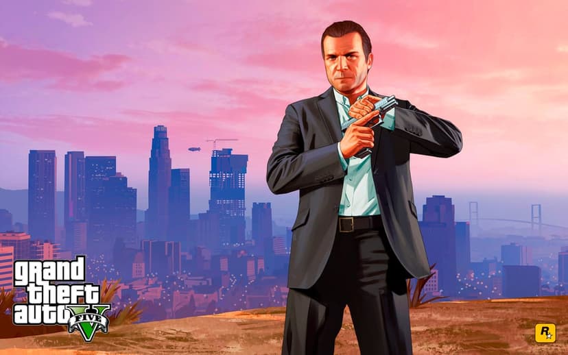 Michael De Santa in a suit holding a pistol overlooking the Los Santos city skyline during a pink sunset.
