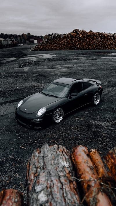 Dark Porsche 911 Sports Car Background for Mobile Screens