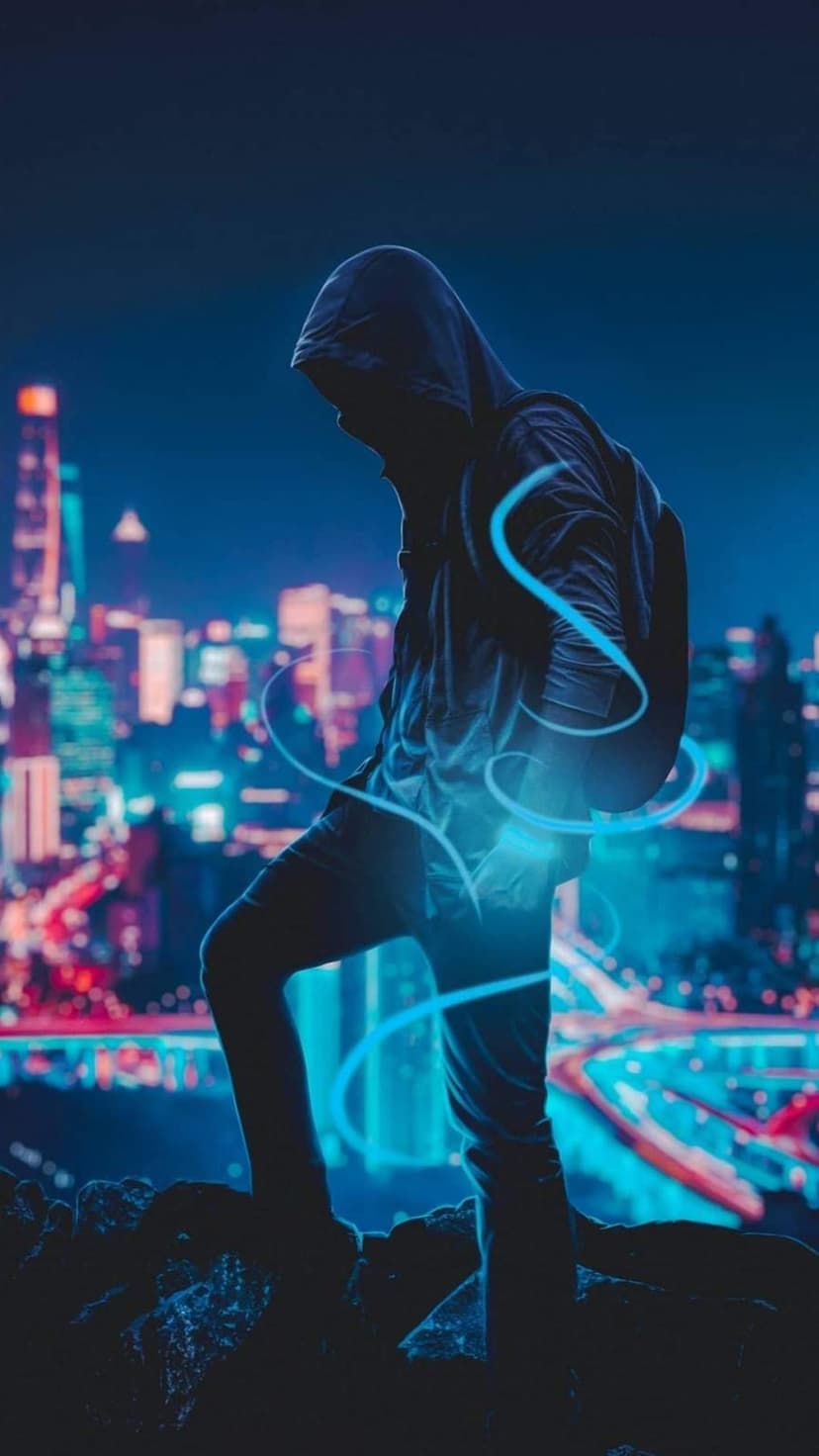 Hooded silhouette standing on a rocky ledge overlooking a neon city with blue energy swirls around their arm