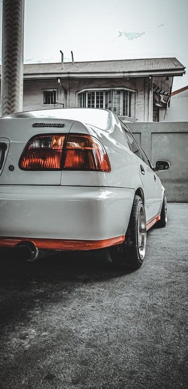 White Honda Civic EG with Mugen Body Kit and Orange Accents