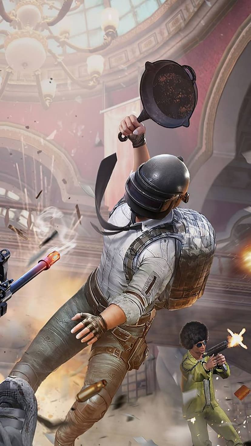 Tactical soldier in a level 3 helmet holds a frying pan amidst flying bullets and fiery battlefield explosions.