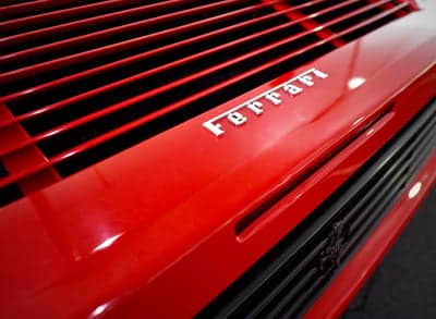 Ferrari Rear Detail and Silver Badge Mobile Wallpaper