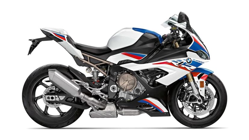 Side profile of a white BMW S1000RR sportbike with blue and red accents on a plain white background.