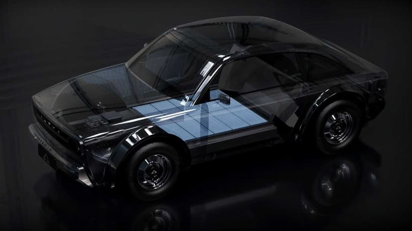 Sleek black electric vehicle with a translucent body showing internal blue battery cells in a dark studio.