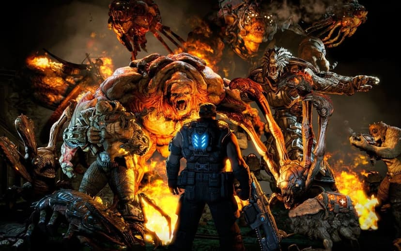 Soldier in heavy armor faces a giant hulking beast and insectoid monsters amidst orange fire and explosions.