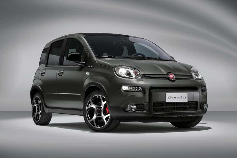 Matte grey Fiat Panda Sport with black alloy wheels and red calipers against a soft grey background.