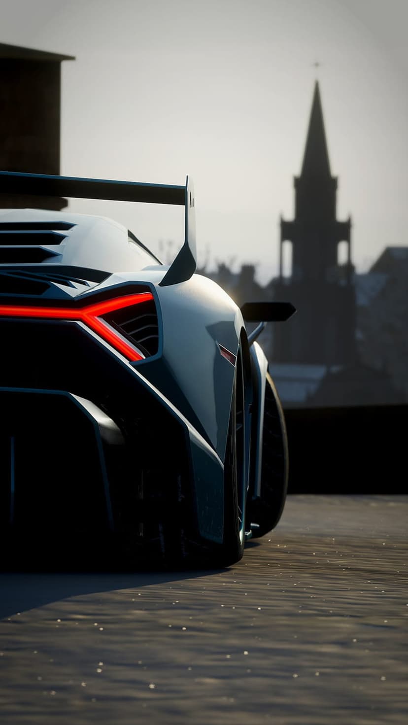 Red LED tail lights of a futuristic supercar glow against a hazy sky and a silhouetted church spire at dusk.