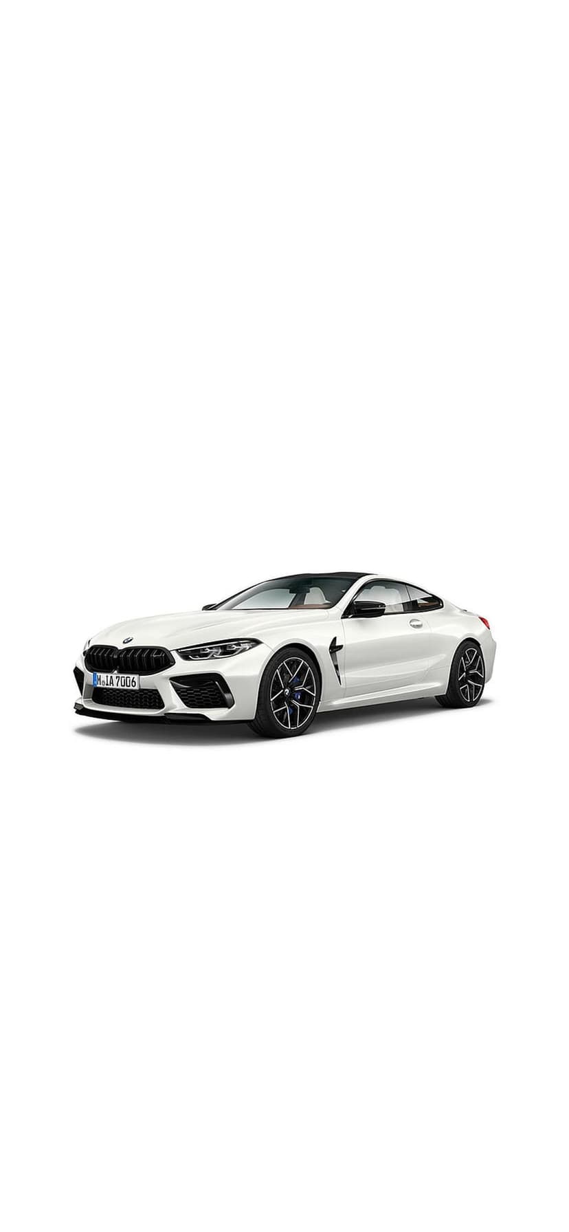 White BMW M8 Coupe showing the aggressive front grille and sleek headlights in a vertical automotive portrait.