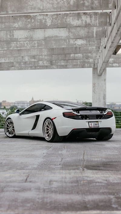 White McLaren Supercar Urban Bridge Mobile Wallpaper