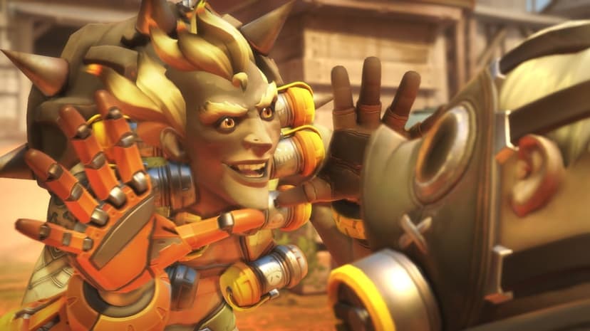 Junkrat with a manic grin looks closely at Roadhog's gas mask in a sunlit desert setting.